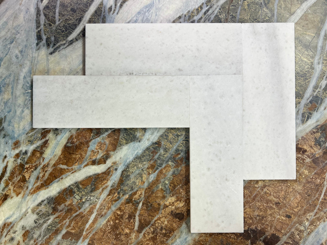 CRYSTAL WHITE SUBWAY MARBLE HONED